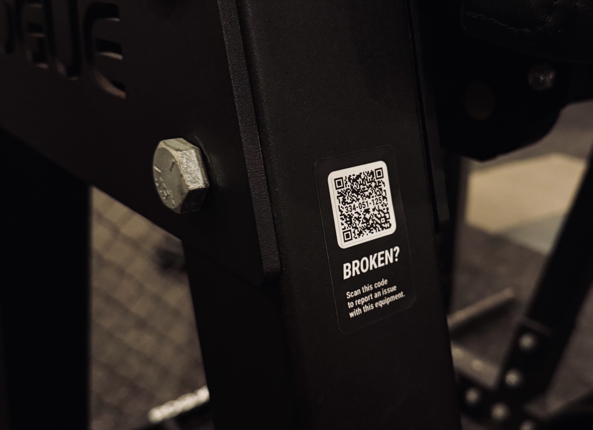 Gear Tag QR sticker applied to gym equipment